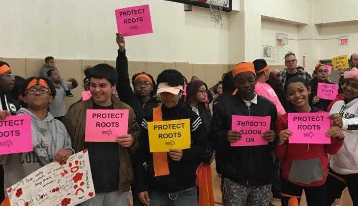 ROOTS Academy students protesting the proposed closure of their school.